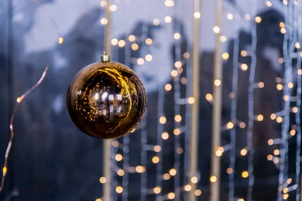 Christmas lights background with clear bauble decoration. Minimal holiday concept with copy space.Dark baubles and golden garland background. Art design,Christmas and New Year concept. abstract golden — Stock Photo, Image