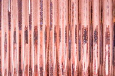 Holographic abstract orange backdrop. Holographic color wrinkled foil. Iridescent art. Trendy creative gradient. Blurred background. TRENDY colorful texture in pastel colors. beautiful iridescent