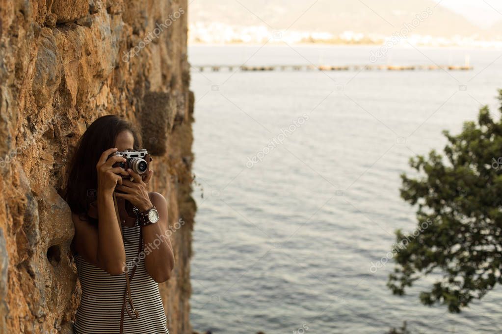 Traveller woman photographing