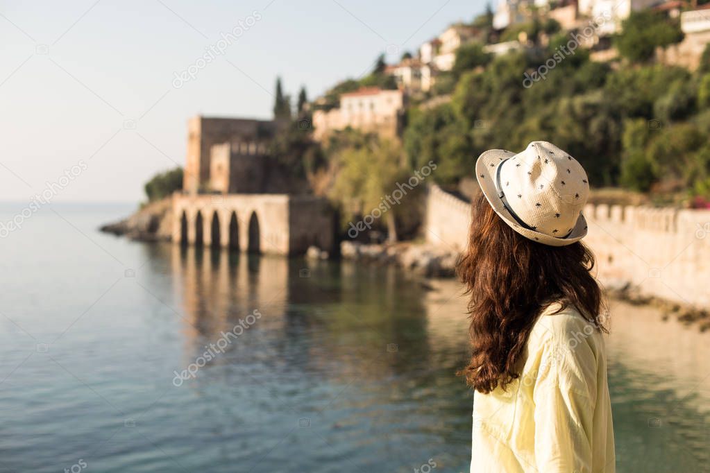 Traveller woman enjoying beautiful seaview