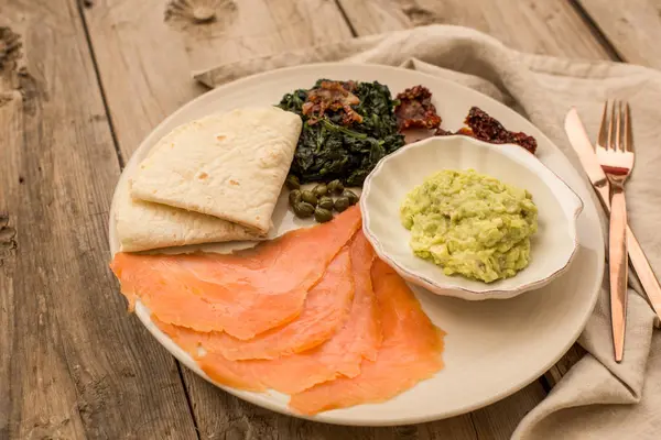 Healthy Breakfast Platter Wooden Rustic Tabletop Guacamole Smoked Salmon Spinhach — Stock Photo, Image