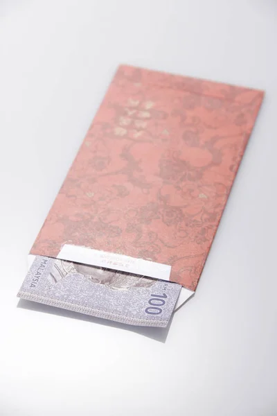 Paquet Ang Pao rouge avec billet de banque Malaisie — Photo