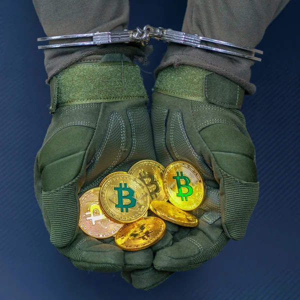 Hareks kelepçe ellerini tutun altın bitcoins tutuklandı.
