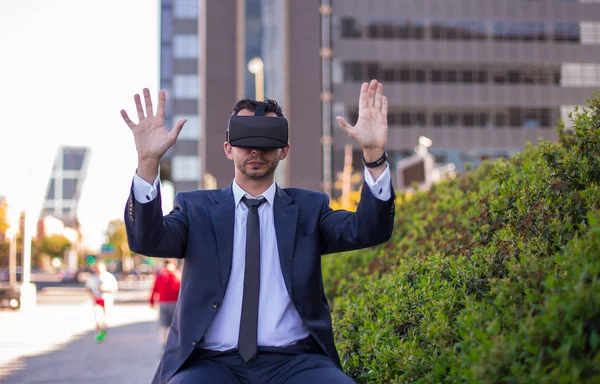 Businessman using virtual reality glasses Stock Photo