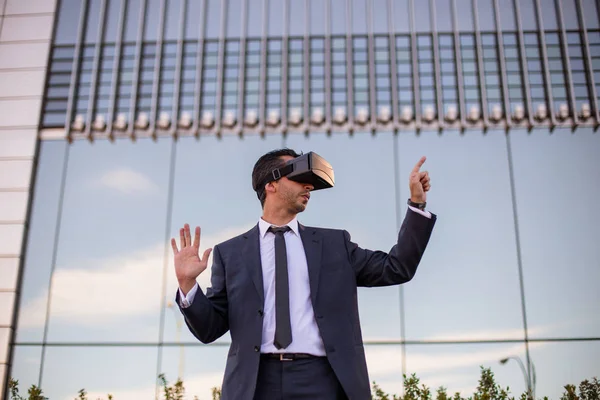 Businessman using virtual reality glasses Stock Image