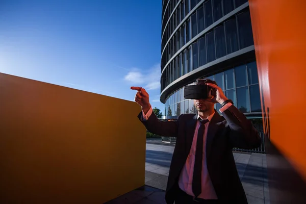 Businessman using virtual reality glasses Royalty Free Stock Photos