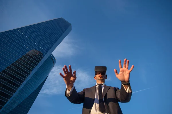 Businessman using virtual reality glasses Stock Image