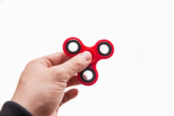 Man holding a fidget spinner — Stock Photo, Image