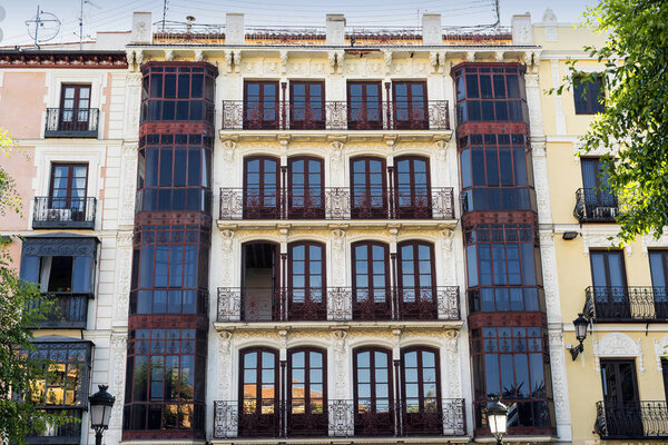 Toledo (Castilla-La Mancha, Spain): facade of historic building with balconies and verandas in the Zocodover square
