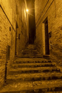 Ripatransone, Ascoli Piceno, Marches, Italy: typical street of the historic town at evening