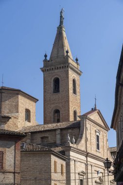 Ripatransone, Ascoli Piceno, Marches, Italy: typical street of the historic town at morning. Church