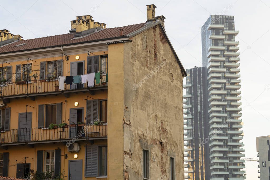 Milan, Lombardy, Italy: Torre Solaria, the highest residential building in Italy, and a traditional house