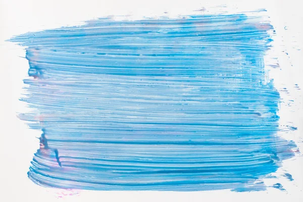 Синий лак для ногтей пятна на белом фоне — стоковое фото