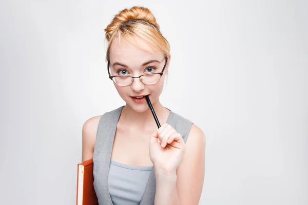 Young woman in glasses gets new idea. Brainstorm. — Stock Photo, Image