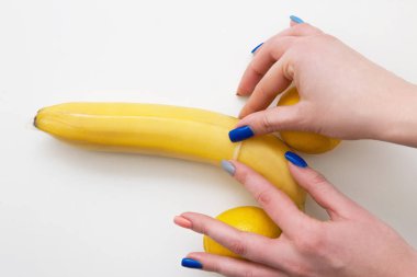 Protected sex, aroused penis. Wearing condom.