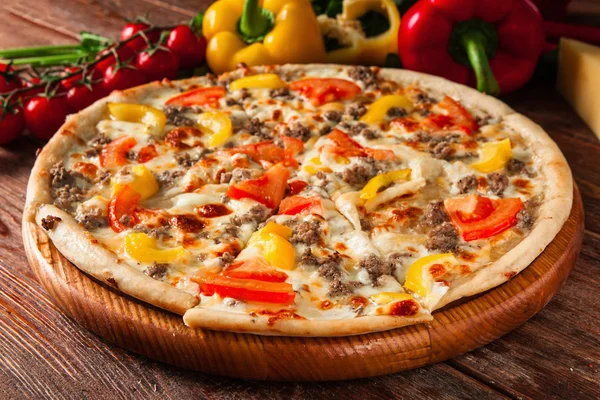 Fresh italian pizza of bright colors. Fast food.
