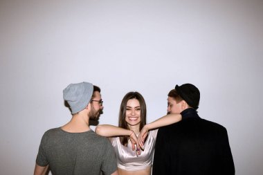 Happy girl in relationship with two men clipart