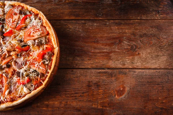 Junk food. Italian pizza cut in slices, flat lay