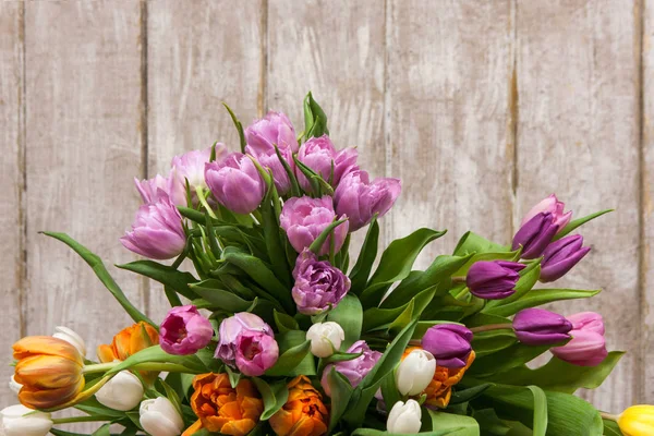 Marco de tulipanes de flores rosadas. Fondo floral — Foto de Stock