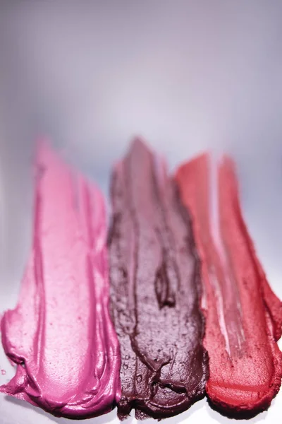 Lipstick smudged in selective focus background