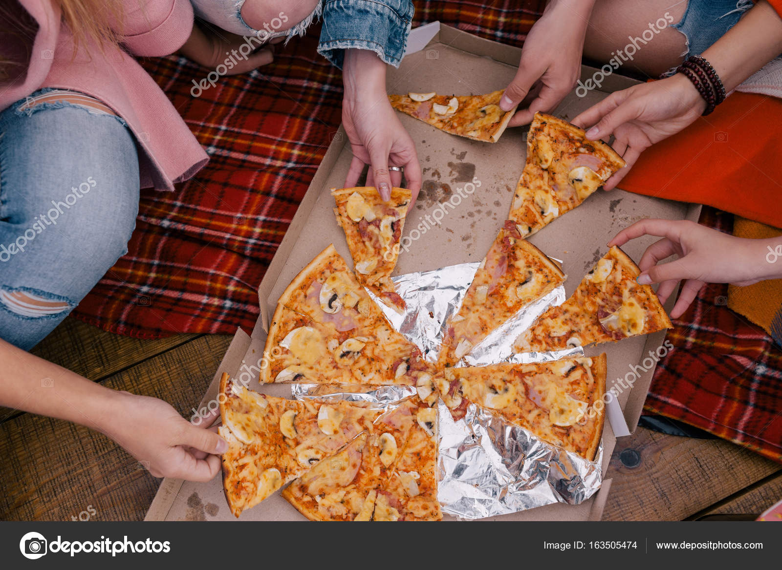 Friends enjoying pizza party Stock Photo by Rido81