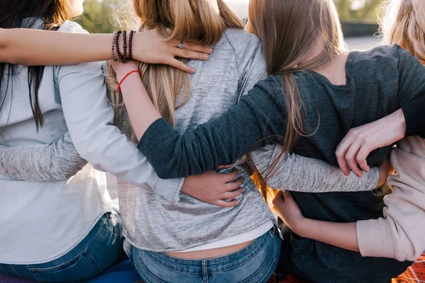 Strong female friendship. Happy pastime outside