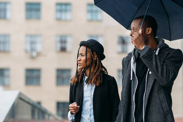 Thoughtful fashion pedestrians. Rainy mood — Stock Photo, Image