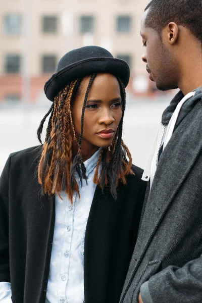 Fashion pedestrian couple. African American youth