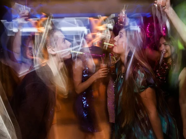 Joyful New Year couple dancing in motion — Stock Photo, Image