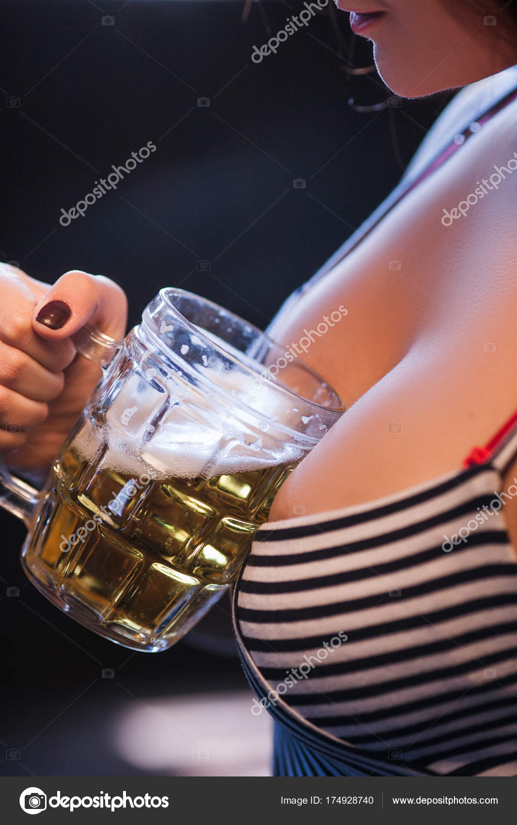 [Jeu] Suite d'images !  - Page 31 Depositphotos_174928740-stock-photo-big-breasts-woman-beer-glass