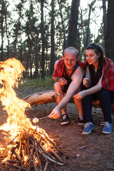 Couple love nature picnic bonfire forest concept.