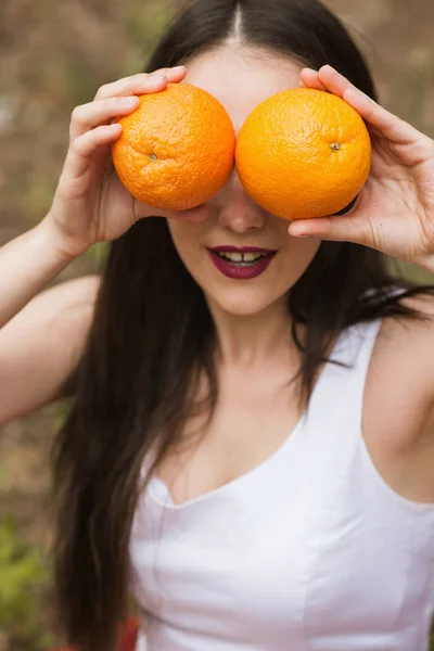 Orange fruit nature woman joking healthy concept. — Stock Photo, Image