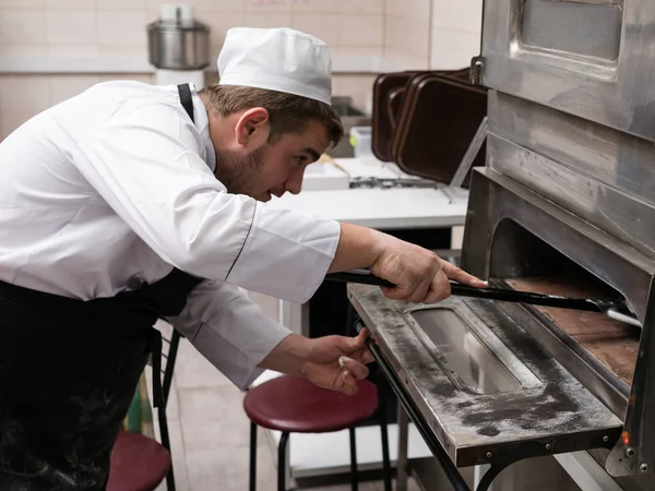 Italian pizza cooking oven baking — Stock Photo, Image