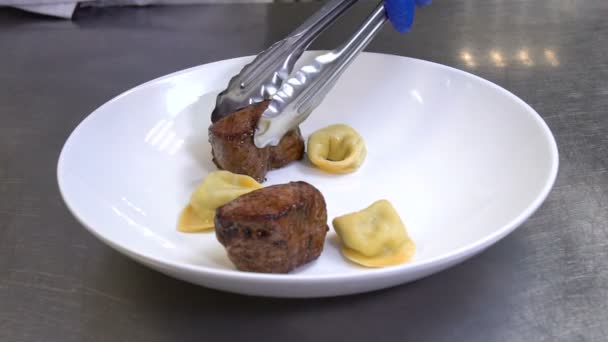 Food stylist restaurant menu chef assembling meal — Stock Video