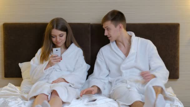 Relationship distrust jealousy woman snoop phone — Stock Video