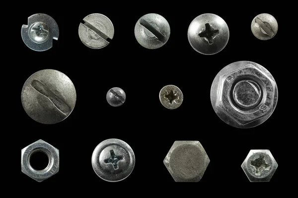 Багато Металевих Гвинтових Головок Горіхів Заклепок Ізольовані Чорному Тлі Макроколір — стокове фото