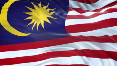 Malezya bayrağı son derece detaylı kumaş dokusuyla rüzgarda dalgalanıyor. Kusursuz döngü