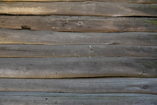 A log house wall with close up log texture. Outside exterior. — Stock Photo, Image