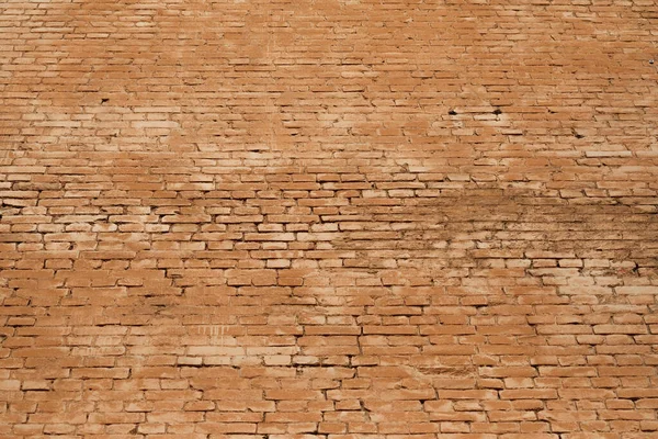 Hintergrund von der Oberfläche des roten Mauerwerks — Stockfoto