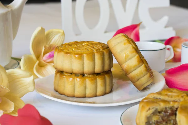 Moon cake, food for Vietnamese mid autumn festival. Focus on moon cake and others are blurred