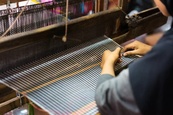 Weaving textile at Champa village, Mekong delta, Vietnam
