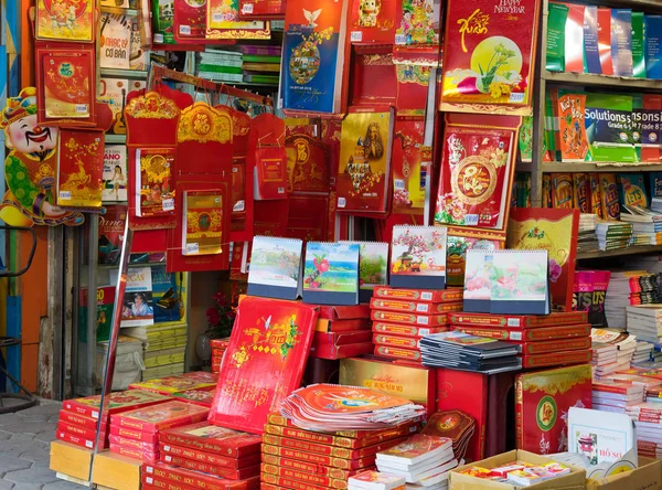 Hanoi, Vietnam - Nov 16, 2014: Bunch of new year calendar displayed on sale in a small book store on Ba Trieu street.