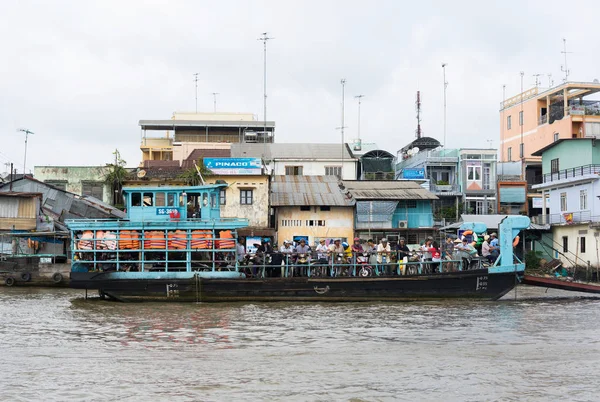 Tien Giang, Vietnam - Nov 28, 2014: Ferry boat, the mean of transportation to transit people cross river in Mekong Delta