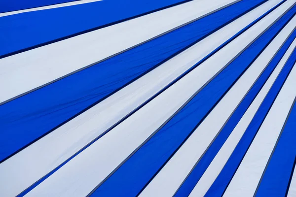 Blue and white striped canvas tent roof