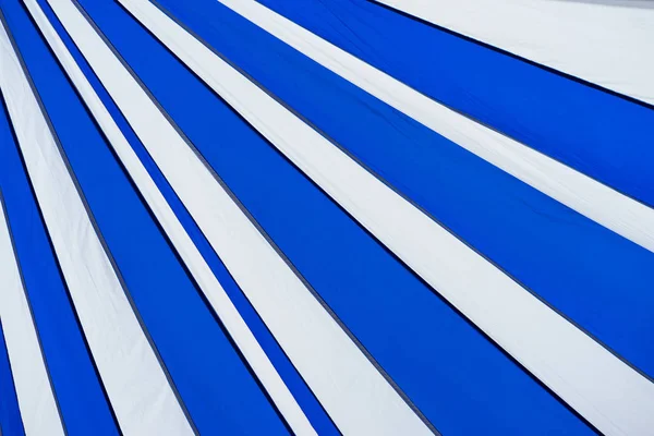 Blue and white striped canvas tent roof