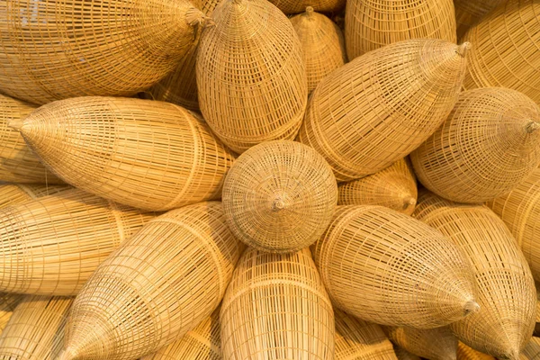 Vietnamese traditional bamboo fish trap background against cultivation field on background  in \