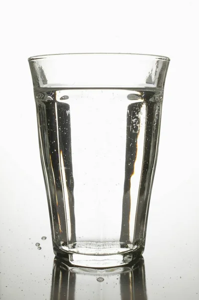 Glass of water on table — Stock Photo, Image