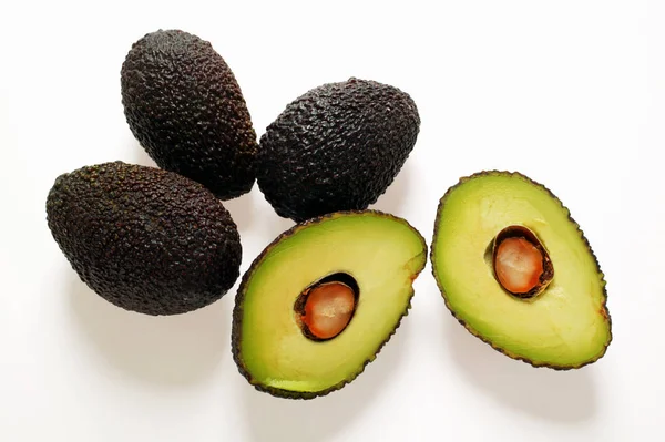 Fresh Mini-avocados with halves — Stock Photo, Image