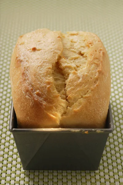 Brioche in baking tin — Stock Photo, Image