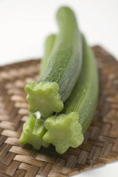 Three fresh courgettes — Stock Photo, Image